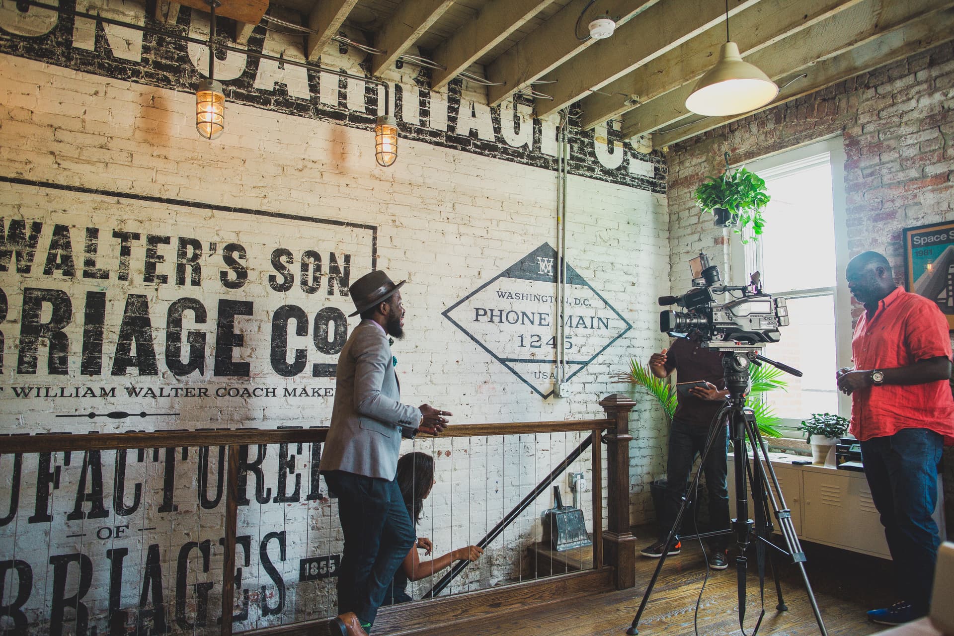 Documenting the Walters ghost sign painting in the carriage house.