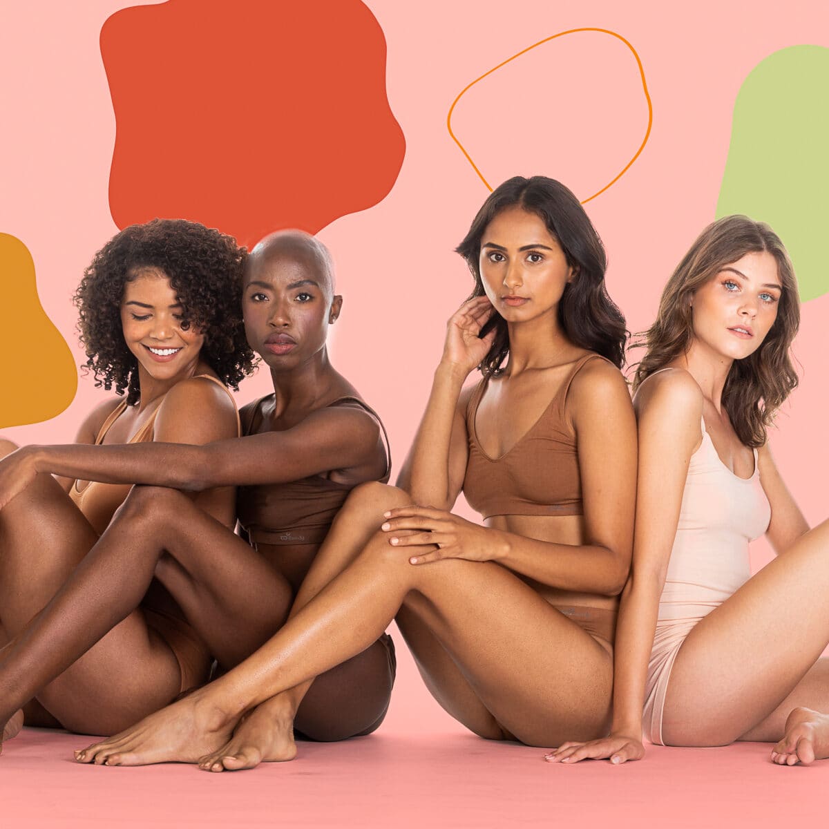 Four of the cast seated against a pink ground with painted shapes