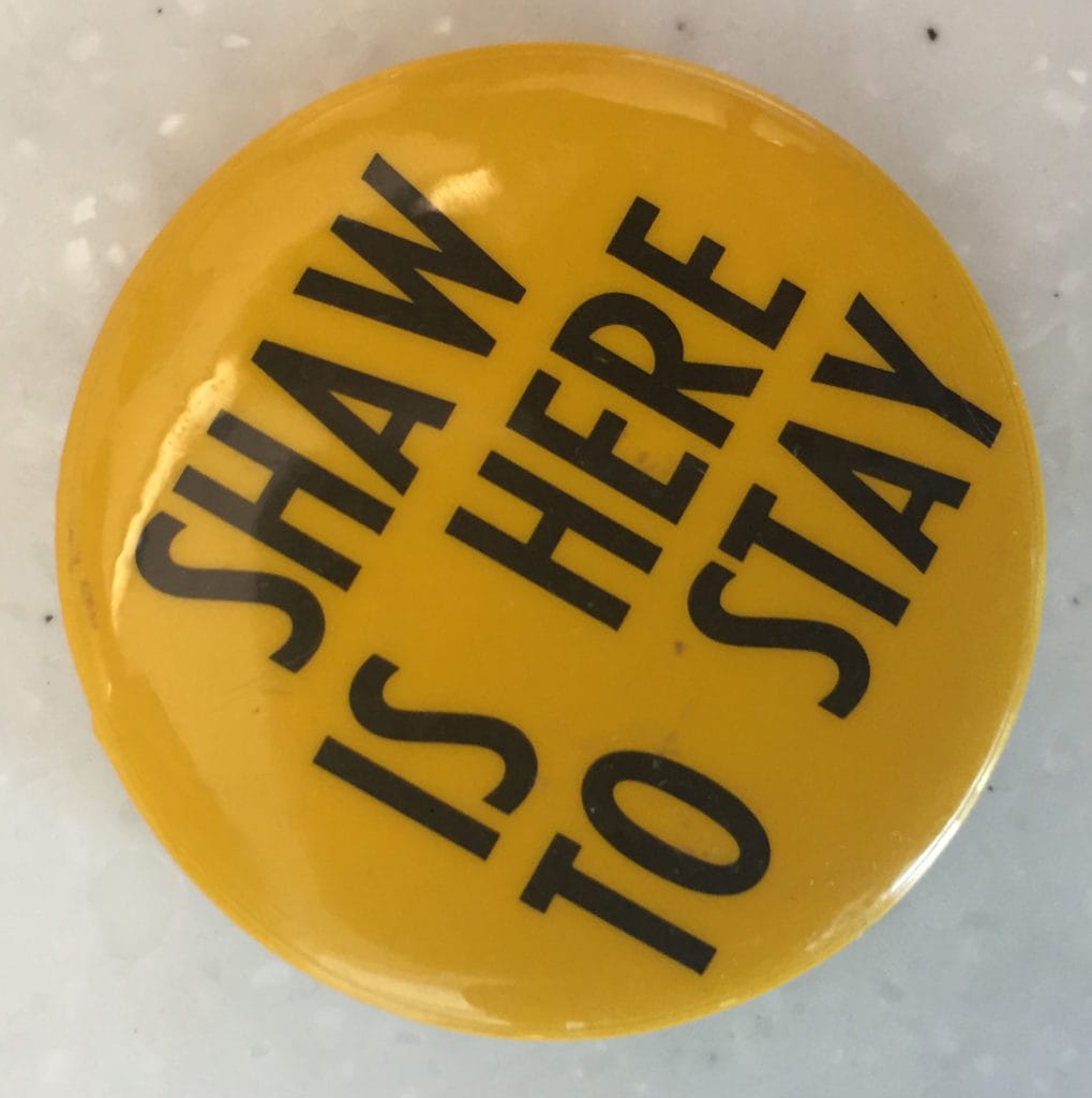 A yellow button reading Shaw Is Here to Stay