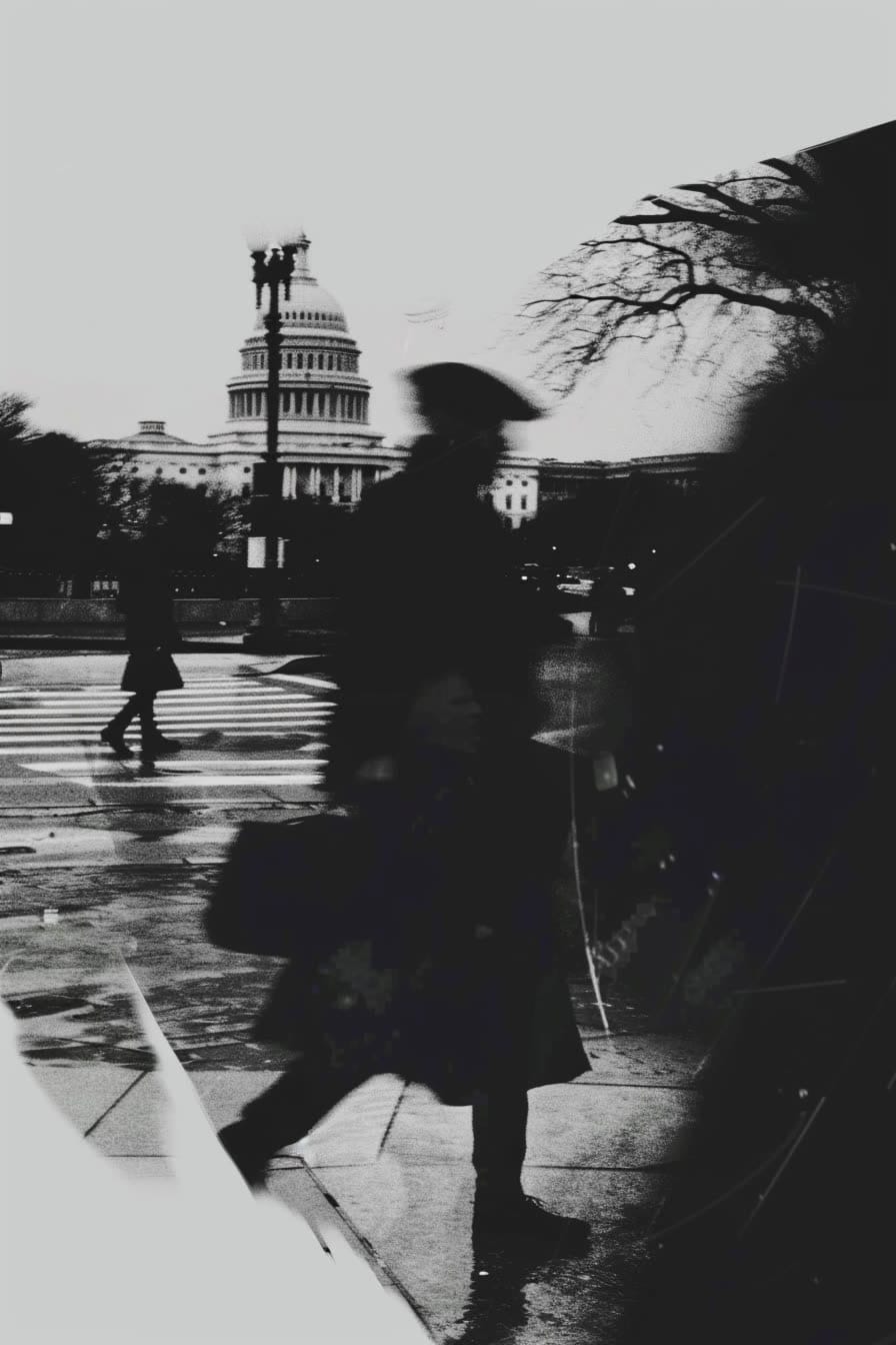 Study: a figure in a hat crossing the plaza in front of the Capitol