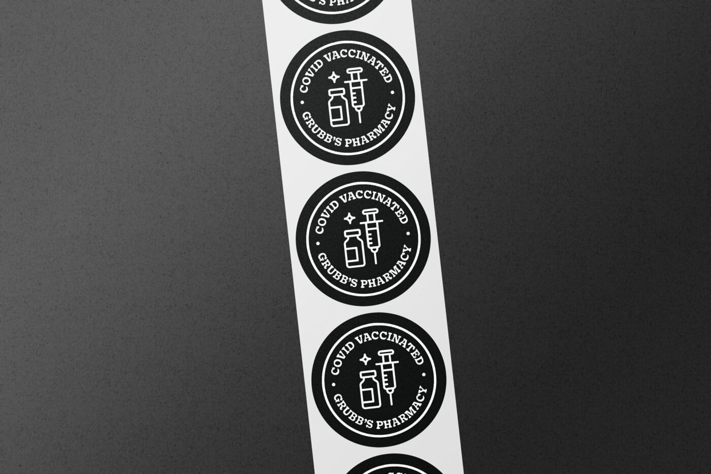 COVID Vaccinated roundel sticker roll