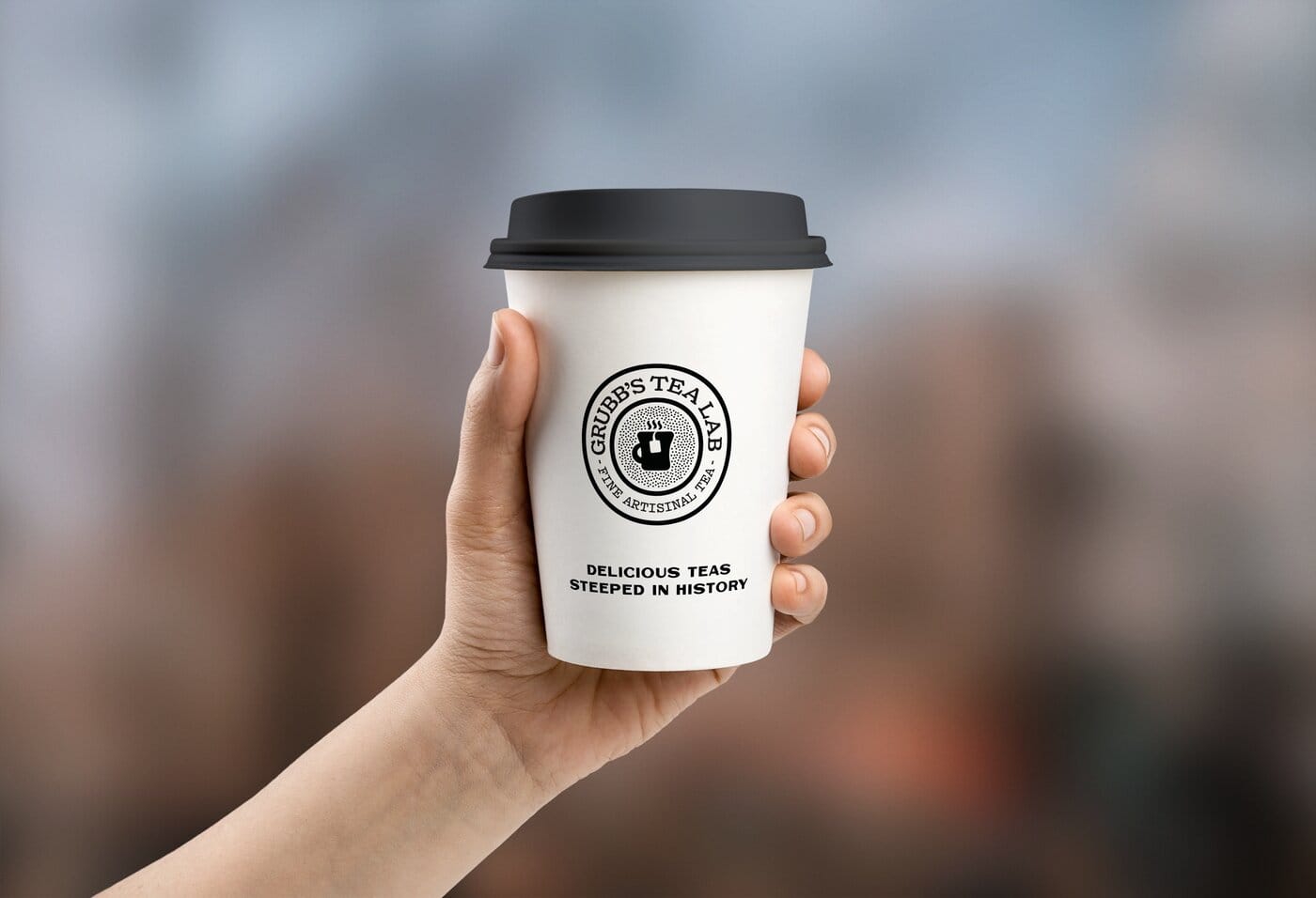 Grubb's Tea Lab cup in hand
