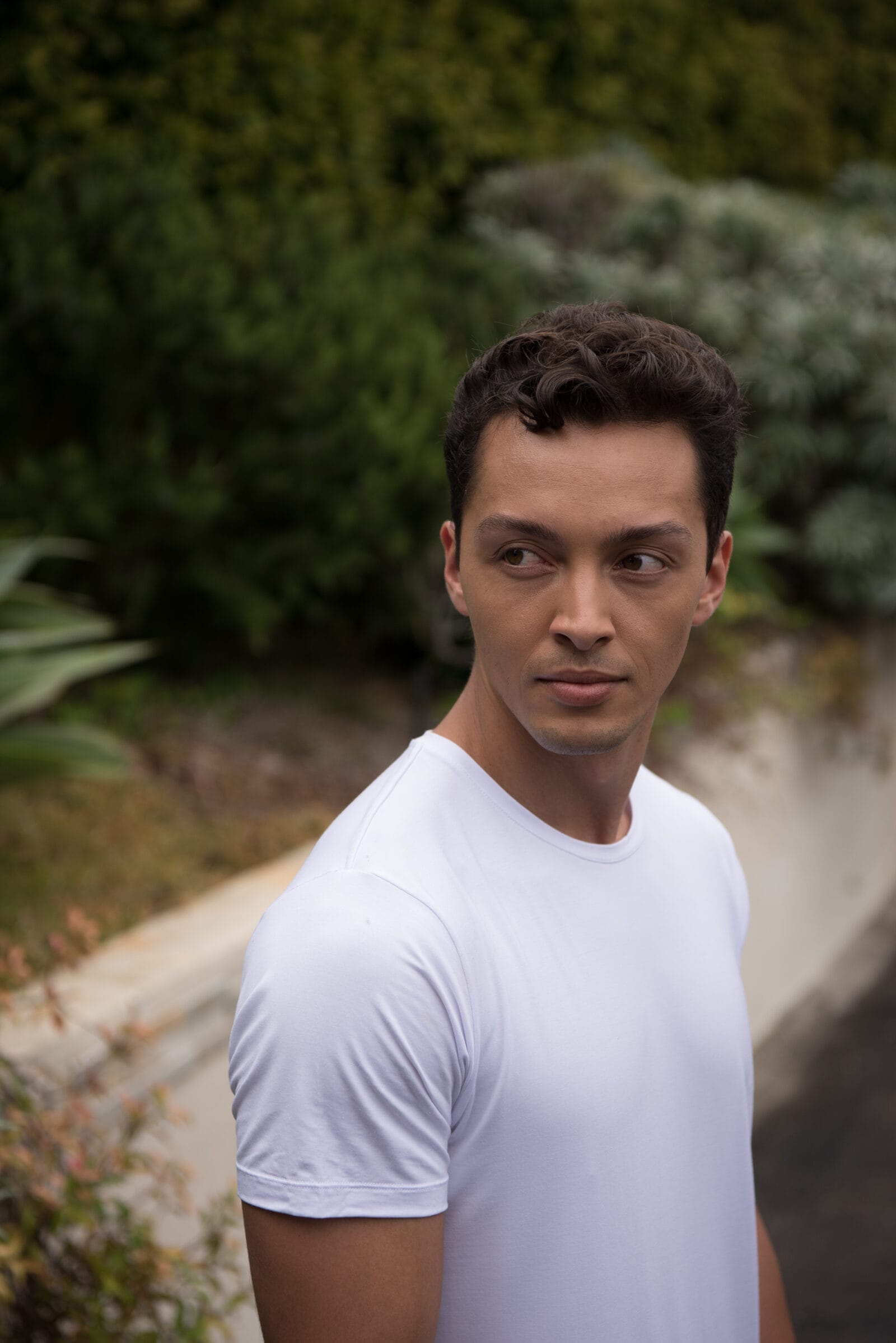 Portrait of one of the cast in the mens tee