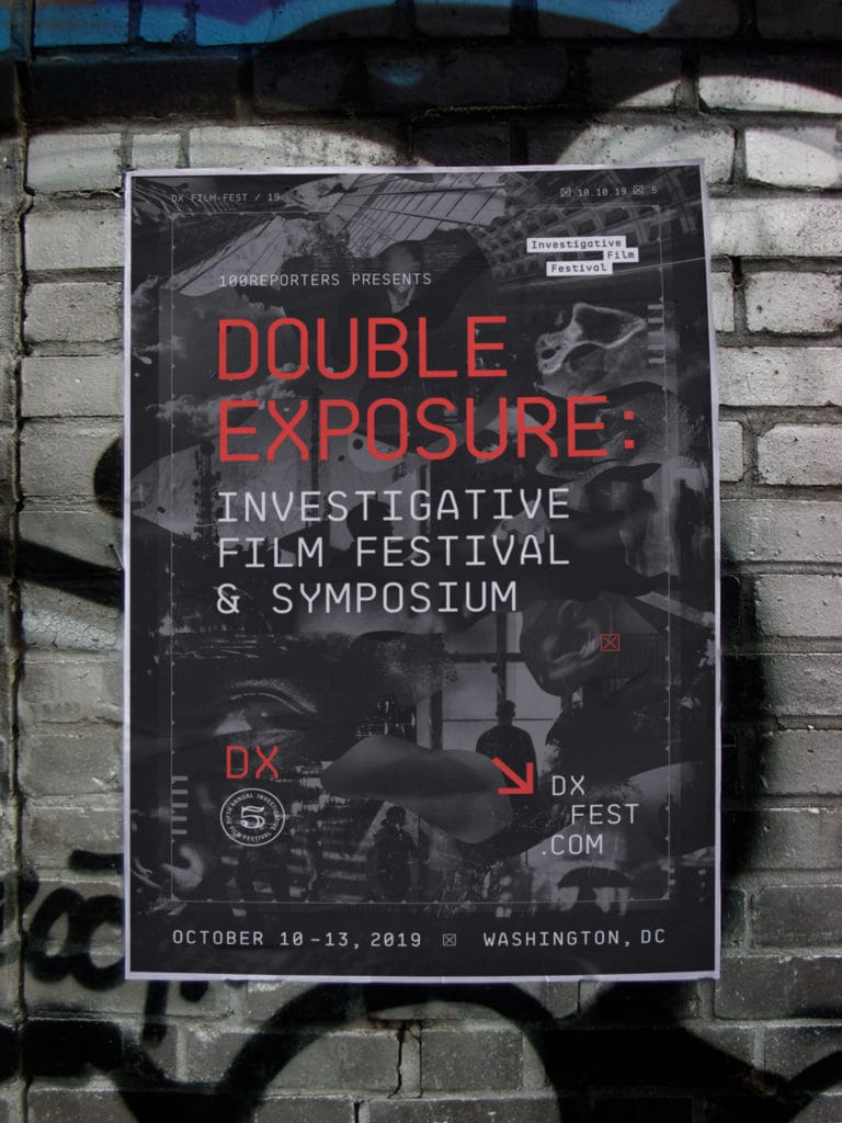 The 2019 poster pasted on a brick wall